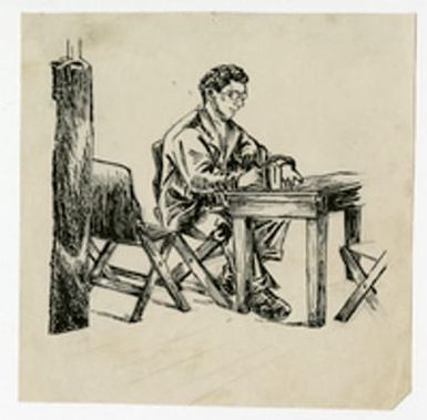 Man Sitting at Desk