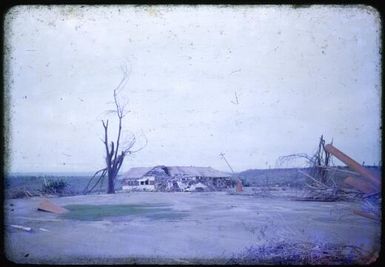 View of the destroyed commissioner's house at Higataru, Papua New Guinea, 1951 / Albert Speer