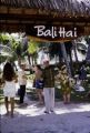 French Polynesia, tourists at entrance to Bali Hai resort on Moorea Island