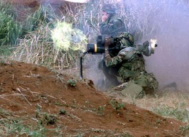 US Marine Corps Lance Corporal Spencer and US Marine Corps Hospitalman Third Class Noah from 1ST Battalion, 3rd Marines, Weapon's Company fire the dragon missile while training at Schofield Army Barracks, Hawaii