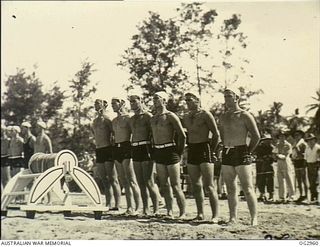 AITAPE, NORTHERN NEW GUINEA.  16 SEPTEMBER 1945. TWO OF THE COMPETING TEAMS AWAITING THE START OF AN EVENT AT THE SURF-LIFESAVING CARNIVAL IN WHICH SOME TWENTY TEAMS FROM RAAF AND AUSTRALIAN ARMY ..