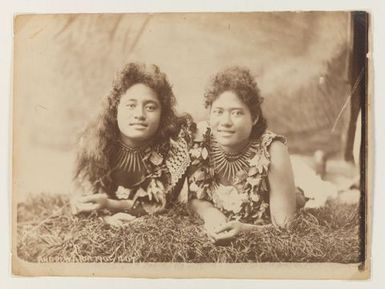 Two leaf-clad women