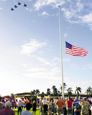 A four ship formation of US Air Force (USAF) F-15 Eagle aircraft perform a fly-over, during the Zero Fighter Pilots Association Flagpole Ceremony. This event was held at Hickam AFB, Hawaii (HI) to commemorate the attack on Hickam Field during the Japanese invasion