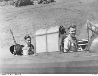 Pilot Officer (PO) John S (Jack) Archer and Sergeant J L (Les) Coulston, both from Melbourne, Vic, seated in No. 4 Squadron, RAAF, Wirraway A20-103. On 26 December 1942 this crew was flying A20-103 ..