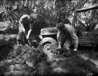 Soldiers digging in the mud, Mono Island, Solomon Islands
