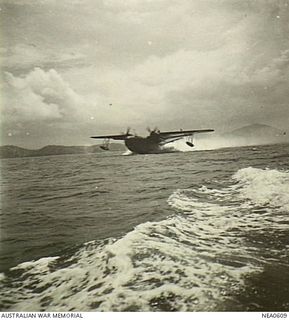 Port Moresby, New Guinea. 1944-08/09. Martin PBM Mariner flying boat aircraft of No. 41 (Transport Sea) Squadron RAAF, based at Cairns, taking off from the water to start the long flight to ..