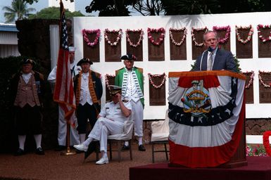 Secretary of the Navy H. Lawrence Garrett III speaks during a ceremony honoring submarine crew members who lost their lives during World War II. The ceremony is taking place as part of an observance of the 50th anniversary of the Japanese attack on Pearl Harbor