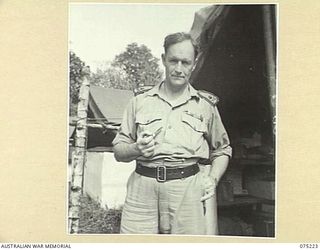 LAE, NEW GUINEA. 1944-08-07. VX20306 CHAPLAIN GENERAL C.L. RILEY, CBE, VD, CHURCH OF ENGLAND BISHOP OF BENDIGO, VICTORIA, HEADQUARTERS, NEW GUINEA FORCE