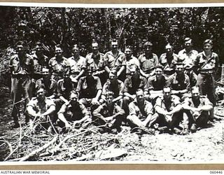 FINSCHHAFEN AREA, NEW GUINEA. 1943-11-07. OFFICERS AND MEN OF HEADQUARTERS, ROYAL AUSTRALIAN ARTILLERY, 9TH AUSTRALIAN DIVISION. THEY ARE, LEFT TO RIGHT: VX50338 GUNNER J. A. MAYNE; WX6034 GUNNER ..