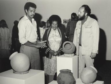 Fiji's leading potter, Amele Nacewa with Ratu Ilisoni Kinivuwai and Rod Ewins at the opening of her pottery exhibition, Hobart, Tasmania, 1987 / Malcolm Lindsay
