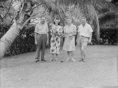 [Portrait of two women and two men]