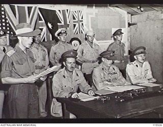 TOROKINA, BOUGAINVILLE. 1945-09-08. LIEUTENANT-GENERAL (LT-GEN) S. G. SAVIGE, GENERAL OFFICER COMMANDING 2 CORPS, ACCEPTED THE SURRENDER OF ALL JAPANESE FORCES ON BOUGAINVILLE FROM LT-GEN M. KANDA, ..