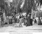 Scientists and natives discussing the food shortage on Rongerik Island, 1947