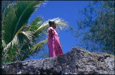 Woman on rocky ridge