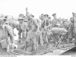 UNIDENTIFIED TROOPS OF 7 MECHANICAL EQUIPMENT COMPANY, COMING ASHORE AFTER ARRIVAL ON THE TROOPSHIP SS TAROONA