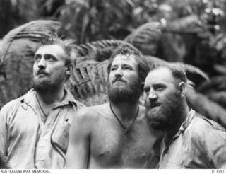 1942-08-28. PAPUA. BEARDED MEMBERS OF THE NEW GUINEA FORCES. (NEGATIVE BY D. PARER)