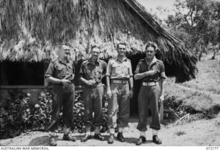 PORT MORESBY, NEW GUINEA. 1944-04-10. MEMBERS OF THE MILITARY HISTORY SECTION, WITH HEADQUARTERS NEW GUINEA FORCE. IDENTIFIED PERSONNEL ARE, LEFT TO RIGHT:- VX72048 SERGEANT F. MCKECHNIE (1); ..