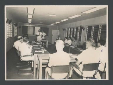 [The Administrator of the Territory of Papua and New Guinea, Sir Donald Cleland, opening the first 'Training within Industry' (T.W.I.) course for Officers of the Territory Public Service, 1954]