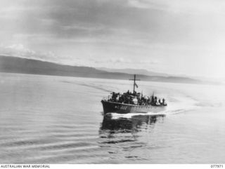 AT SEA. C. 1944-12-31. THE RAN VESSEL ML802 MOVING THROUGH JACQUINOT BAY