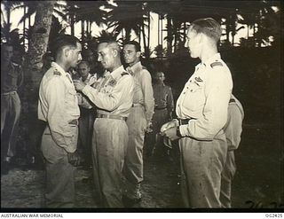 MOROTAI, HALMAHERA ISLANDS, NETHERLANDS EAST INDIES. 1945-04-11. FOR HIS GALLANTRY IN RECOVERING MINES WHICH WERE IMPEDING THE ADVANCE OF US TANKS ON THE ADMIRALTY ISLANDS IN 1944, FLIGHT ..