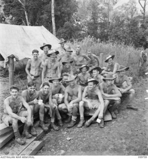 DONADABU, NEW GUINEA. 1943-11-03. GROUP PORTRAIT OF SAPPERS OF NO. 3 PLATOON, 18TH AUSTRALIAN FIELD COMPANY, ROYAL AUSTRALIAN ENGINEERS WHO ARE ENGAGED ON THE REBUILDING OF A BRIDGE OVER EWARIGO ..