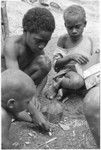 Young boys playing dice