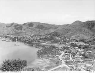 PORT MORESBY AREA, NEW GUINEA. 1943-12-29. VIEW FROM THE TUA-GUBA HILL SHOWING THE PANORAMA FROM THE ROYAL AUSTRALIAN AIR FORCE HEADQUARTERS, GENERAL HEADQUARTERS AND THE UNITED STATES NAVY ..