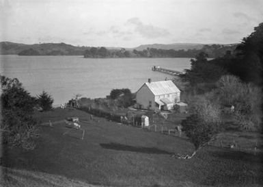 Mahurangi Heads. Showing wharf and B.R. Palmer's house. 1913.