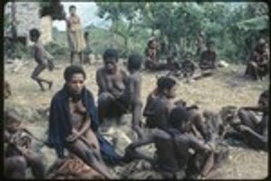 Women and children outside Cook and Pflanz's house