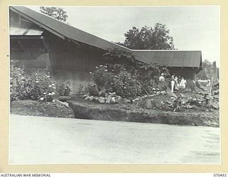 EGGY'S CORNER, PORT MORESBY AREA, PAPUA, 1944-02-19. THE OFFICERS' WARD AT THE 2/1ST GENERAL HOSPITAL SHOWING THE SURROUNDING GARDENS