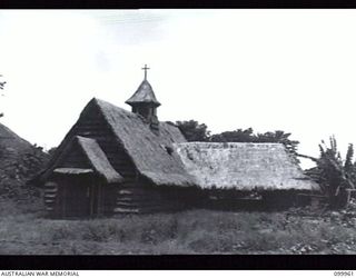 RABAUL, NEW BRITAIN, 1946-04-04. ONE OF THE MANY CHAPELS BUILT IN THE AREA SINCE THE OCCUPATION BY 11 DIVISION. THIS CHURCH OF ENGLAND CHAPEL HAS STAINED GLASS WINDOWS