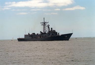 The guided missile frigate USS JOHN H. SIDES (FFG-14) heads into the channel as it arrives at Naval Station, Pearl Harbor, Hawaii.