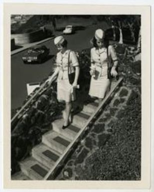 Sue Oliver (in front) and another Women Marine walk down the stairs at the National Memorial Cemetery of the Pacific ("The Punchbowl") in Ohau, Hawaii. Circa 1971