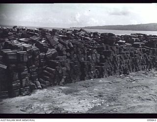 RABAUL, NEW BRITAIN, 1946-02-19. A SECTION OF A LARGE JAPANESE AMMUNITION DUMP CONTAINING SOME 20,000 TONS TO BE DESTROYED. DUMPING OPERATIONS OF JAPANESE AMMUNITION AND EXPLOSIVES WERE CARRIED OUT ..