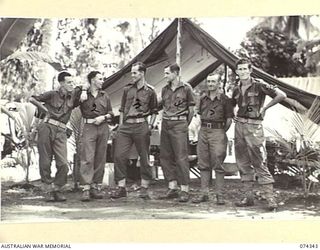 SIAR, NEW GUINEA. 1944-06-25. PERSONNEL OF THE WELFARE SECTION, 57/60TH INFANTRY BATTALION. IDENTIFIED PERSONNEL ARE:- VX135956 CORPORAL W. JANS (1); VX111587 PRIVATE B.A. BARNARD (2); VX104114 ..