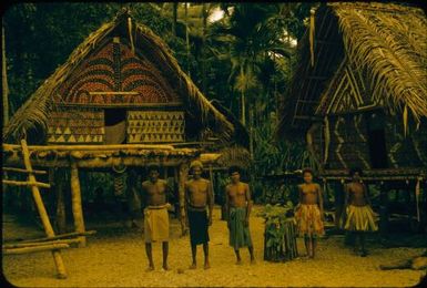 Lower Normanby, decorated houses, and group of people : Normanby Island, D'Entrecasteaux Islands, Papua New Guinea, 1956-1959 / Terence and Margaret Spencer