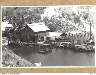 NAPA NAPA, NEW GUINEA. 1943-11-12. WORKSHOPS AND SURROUNDING AREA OF THE 2ND AUSTRALIAN WATERCRAFT WORKSHOPS, AUSTRALIAN ELECTRICAL AND MECHANICAL ENGINEERS