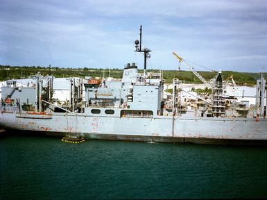 A partial starboard view of the combat stores ship USS SAN JOSE (AFS 7) moored at the US Naval Ship Repair Facility