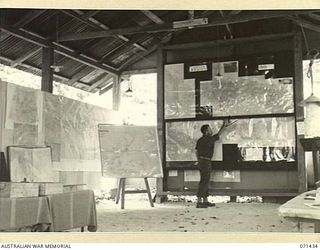 FINSCHHAFEN AREA, NEW GUINEA, 1944-03-21. AN INTERIOR VIEW OF THE BATTLE ROOM AT HEADQUARTERS, 2ND AUSTRALIAN CORPS