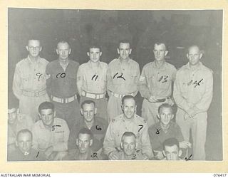 LAE, NEW GUINEA. 1944-10-03. THE OFFICER COMMANDING, 22ND WORKS COMPANY VX104118 MAJOR R.C. UPSON (7) AND SOME OF THE GUESTS WHO ATTENDED THE UNIT DANCE TENDERED TO MEMBERS OF THE AUSTRALIAN ARMY ..