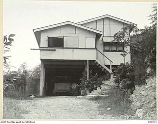 PORT MORESBY, NEW GUINEA, 1944-03-04. THIS VICILIAN COTTAGE AT THE SOUTHERN END OF CUTHBERTSON STREET, PAGA HILL, WAS USED AS A STUDIO BY OFFICIAL WAR ARTISTS OF THE AUSTRALIAN MILITARY HISTORY ..