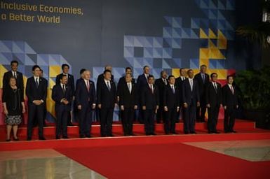 Barack Obama joins Asia Pacific Economic Cooperation Summit leaders for a photo in Manila, Philippines, November 19, 2015