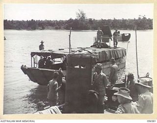 SORAKEN PENINSULA, BOUGAINVILLE. 1945-09-14. A MOTOR LAUNCH CARRYING MEMBERS OF HEADQUARTERS 2 CORPS, PREPARED FOR SURRENDER DISCUSSIONS WITH THE JAPANESE AT A SEA RENDEZVOUS OFF SORAKEN PENINSULA, ..