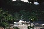 R/V Spencer F. Baird (Ship), moored at a dock in American Samoa located in the South Pacific Ocean, during the Capricorn Expedition (1952-1953). January 1953