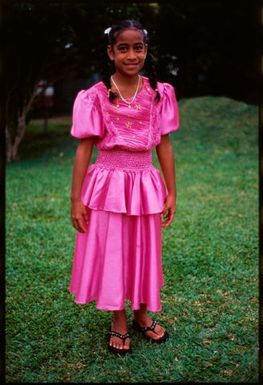 Young girl wearing a pink dress,Tonga