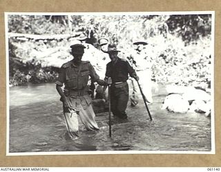 FARIA VALLEY, NEW GUINEA. 1943-11-14. VX9 MAJOR GENERAL G. A. VASEY CB CBE DSO (1) GENERAL OFFICER COMMANDING, 7TH AUSTRALIAN DIVISION, AND MAJOR GENERAL J. S. LETHBRIDGE CBE MC (2), LEADER OF THE ..