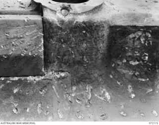 FORTIFICATION POINT, NEW GUINEA. 1944-04-06. THE EFFECT OF A HOLLOW CHARGE PROJECTILE FIRED FROM A JAPANESE 75MM REGIMENTAL GUN TYPE MEIJI 41 AT THE FRONTAL ARMOUR OF A DISABLED MATILDA TANK DURING ..