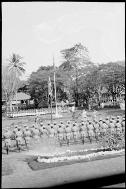 Police standing on parade, Rabaul, New Guinea, ca. 1929 / Sarah Chinnery