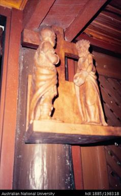 New Caledonia - detail of wooden sculpture with cross