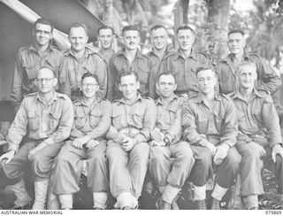 ALEXISHAFEN NORTH, NEW GUINEA. 1944-09-01. SENIOR NON COMMISSIONED OFFICERS AT THE MEDICAL DRESSING STATION OF THE 2/15TH FIELD AMBULANCE. IDENTIFIED PERSONNEL ARE:- NX131504 SERGEANT A.C. KENNEDY ..